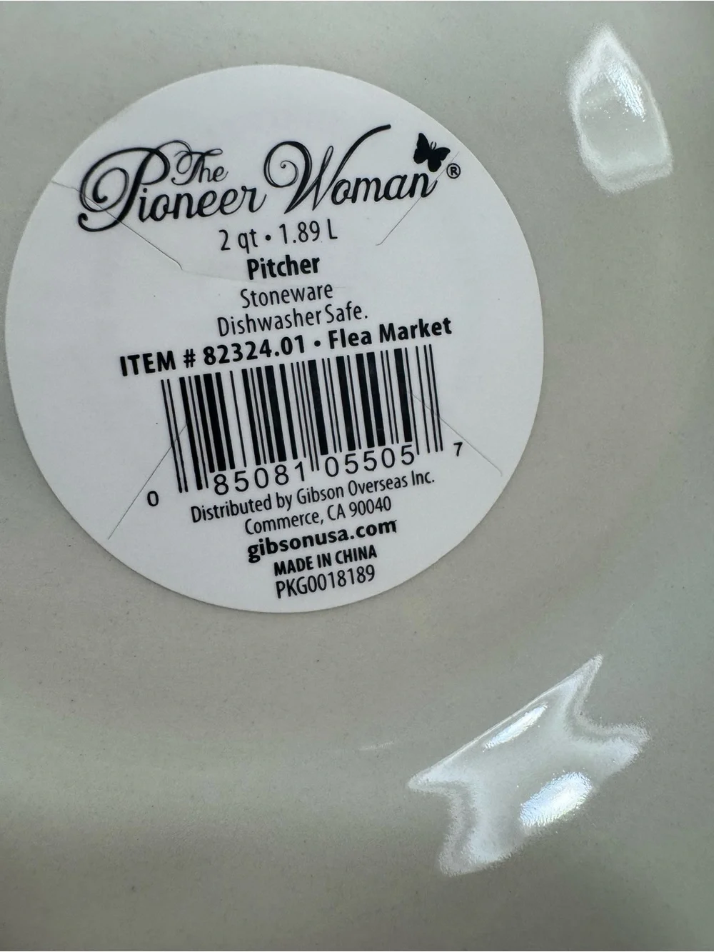 The Pioneer Woman Ceramic Floral Pitcher in Yellow, Red-Orange, and Mint